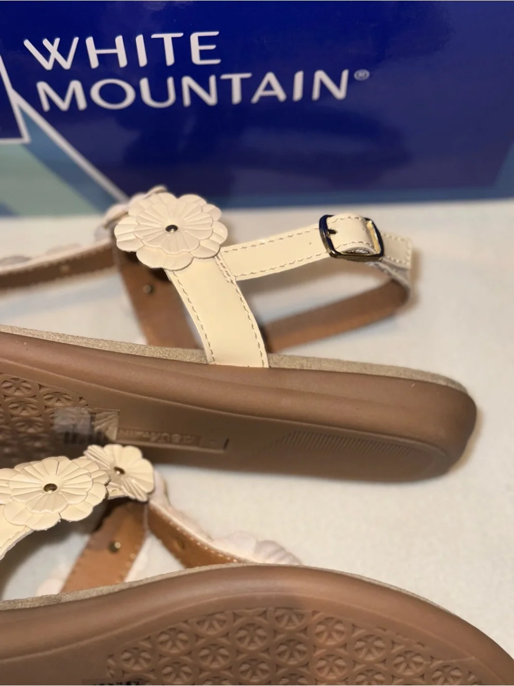 White Mountain Liftoff Flat Sandals feature delicate floral applique on T-strap